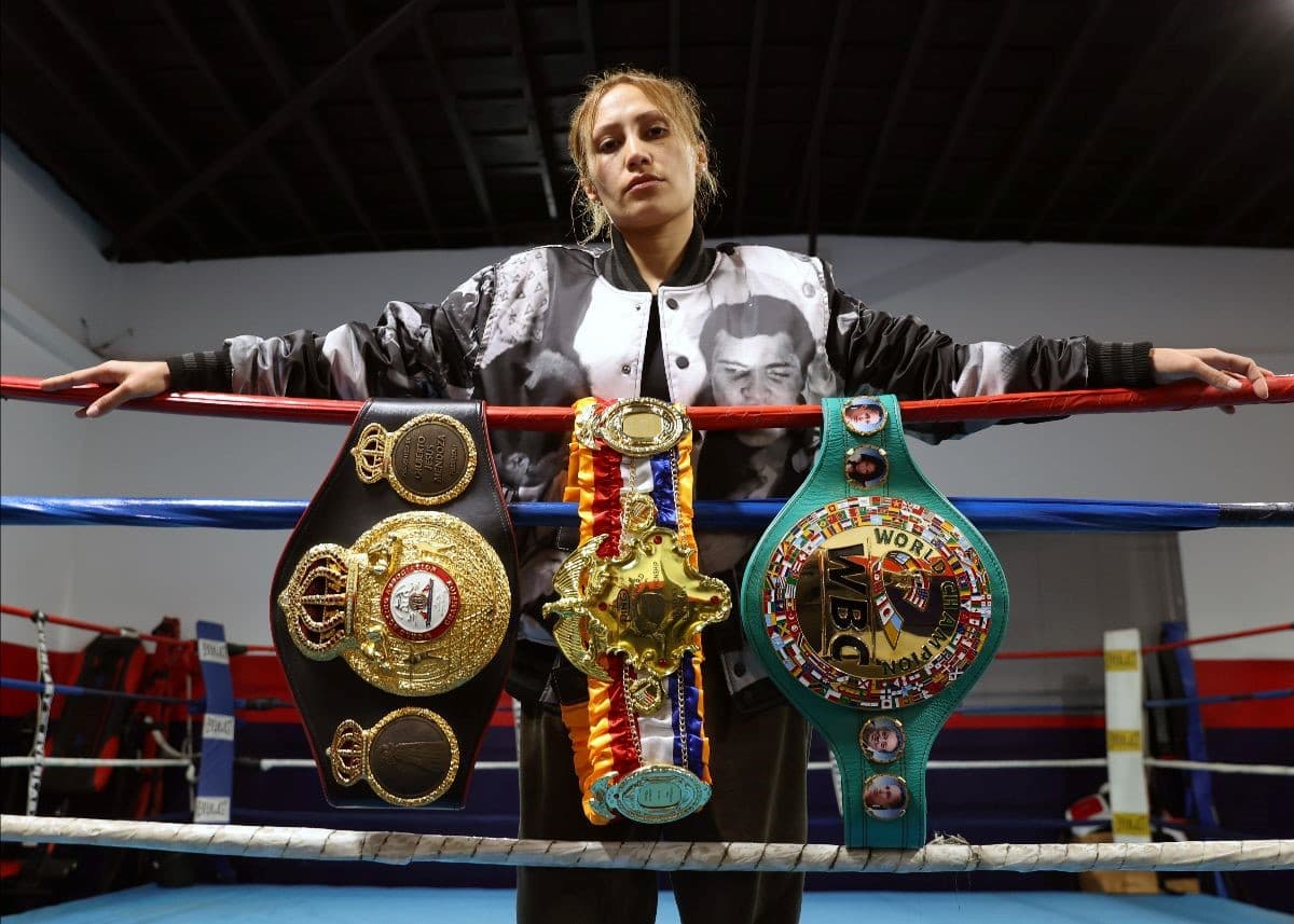 Seniesa Estrada Posing With Belts