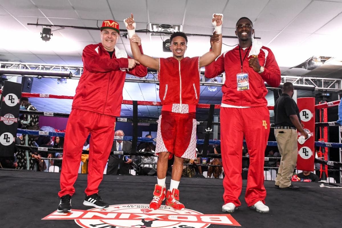 Darren Cunningham Red Shorts With Team