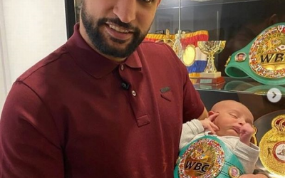 Amir Khan presents baby world champion in WBC belt