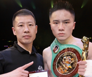 Longyi Hu takes WBC China Glory title Chunhua Yang